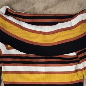 Off the shoulder sweater. Size 18/20 Black, white, orange and yellow.